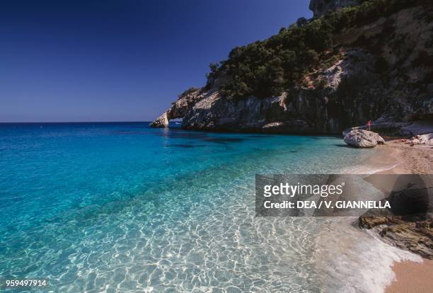 Cala Goloritze, beach with natural stone arch, National Park of the Bay of Orosei and Gennargentu, Ogliastra, Sardinia, Italy.