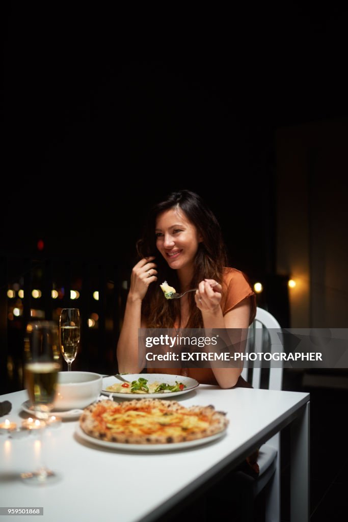 Woman having dinner
