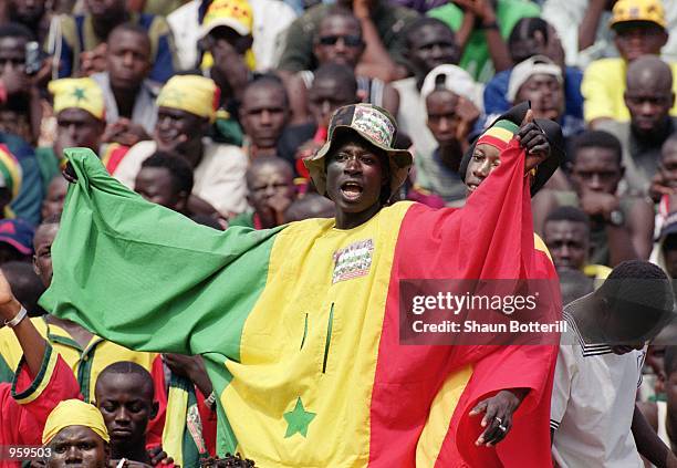 Senegal fans enjoy the action during the FIFA 2002 World Cup Qualifyng match against Morocco played at the Stade Leopold Sedar Senghor in Dakar,...