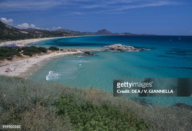 Peppino's beach and rock from Punta Santa Giusta, with Capo Ferrato in the background, Costa Rei, Sardinia, Italy.