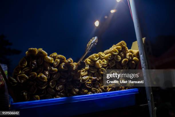 Foods is seen for iftar on the first day of the holy month of Ramadan at the yard of Grand mosque on May 17, 2018 in Surabaya, Indonesia. Indonesia...