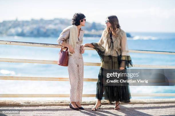 Guests talking with each toher during Mercedes-Benz Fashion Week Resort 19 Collections at Icebergs Dining Room on May 17, 2018 in Sydney, Australia.