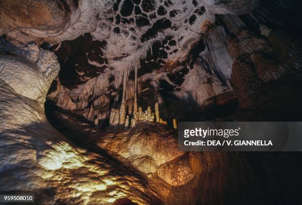 Grotta di Santa Barbara cave, with barite crystals forming honeycomb structures on the ceiling, surroundings of Iglesias, Iglesiente, Sardinia, Italy.