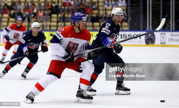 Alex Debrincat of the United States and Radek Faksa of Czech Republic battle for the puck during the 2018 IIHF Ice Hockey World Championship Quarter...