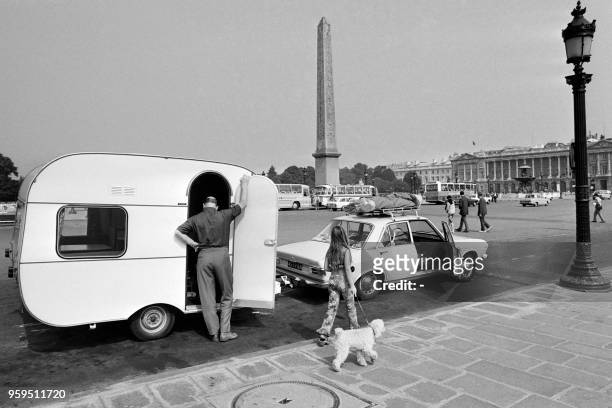 Caravan with dutch tourists parks in Place de la Concorde, on july 1972, in Paris.