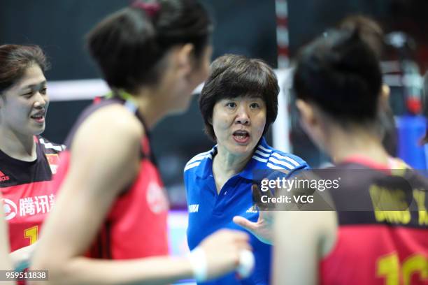 Head coach Lang Ping of China speaks to her players against South Korea during the FIVB Volleyball Nations League 2018 at Beilun Gymnasium on May 17,...