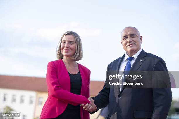 Federica Mogherini, foreign policy chief of the European Union , left, is greeted by Boyko Borissov, Bulgaria's prime minister, as she arrives for an...