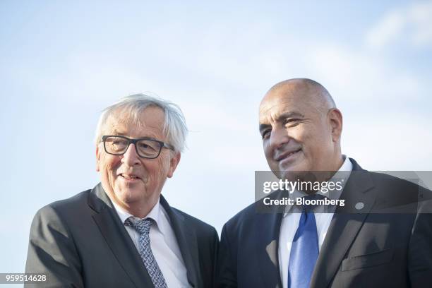 Jean-Claude Juncker, president of the European Commission, left, is greeted by Boyko Borissov, Bulgaria's prime minister, as he arrives for an...