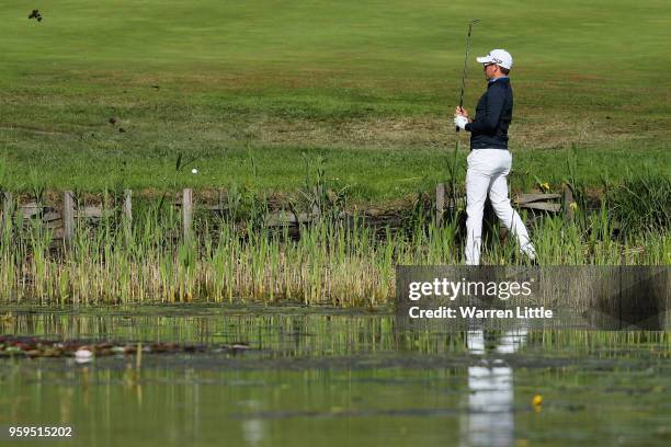 Josh Geary of New Zealand plays his second shot out of the water on the 2nd hole during the first round of the Belgian Knockout at the Rinkven...