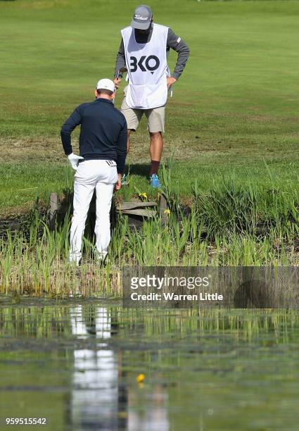 Josh Geary of New Zealand plays his second shot out of the water on the 2nd hole during the first round of the Belgian Knockout at the Rinkven...