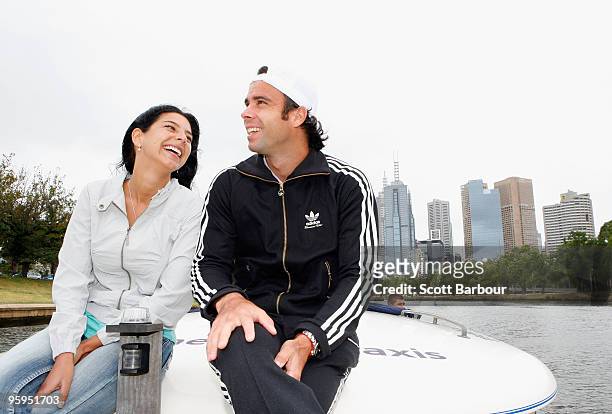Fernando Gonzalez of Chile and his partner Daniela Castillo relax on a boat ride along the Yarra River during day six of the 2010 Australian Open on...