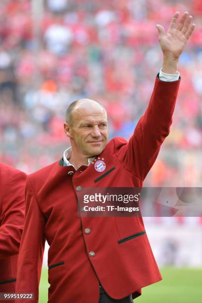 Johannes Christian Hansi Pfluegler gestures prior to the Bundesliga match between FC Bayern Muenchen and VfB Stuttgart at Allianz Arena on May 12,...