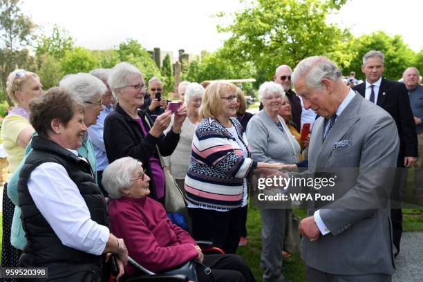 Prince Charles, Prince of Wales greets well wishers as he attends the dedication service for the National Memorial to British Victims of Overseas...