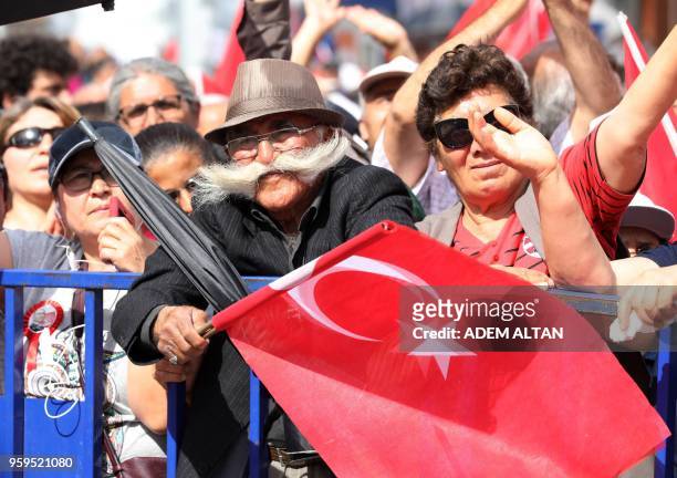 Supporters of Muharrem Ince, Presidential candidate of Turkey's main opposition Republican People's Party , cheer during an election campaign rally...