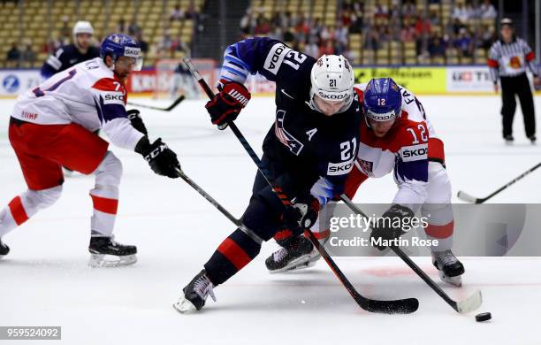 Dylan Larkin of the United States and Radek Faksa of Czech Republic battle for the puck during the 2018 IIHF Ice Hockey World Championship Quarter...