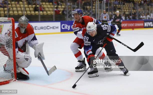 Cam Atkinson of the United States and Filip Hronek of Czech Republic battle for the puck during the 2018 IIHF Ice Hockey World Championship Quarter...