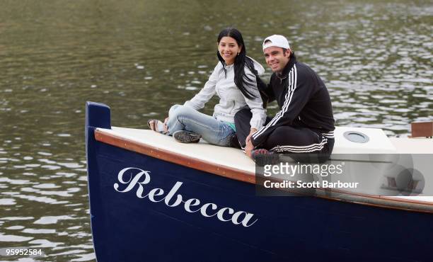 Fernando Gonzalez of Chile and his partner Daniela Castillo relax on a boat ride along the Yarra River during day six of the 2010 Australian Open on...