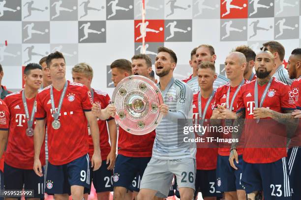 Goalkeeper Sven Ulreich of Muenchen celebrates winning the championship after the Bundesliga match between FC Bayern Muenchen and VfB Stuttgart at...
