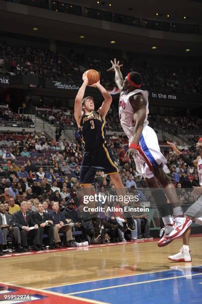 Troy Murphy of the Indiana Pacers goes up for a shot attempt against Ben Wallace of the Detroit Pistons in a game at the Palace of Auburn Hills on...