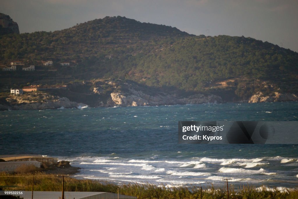 Europe, Greece, Rhodes Island, 2017: View Of Coastline With Hills And Rough Sea