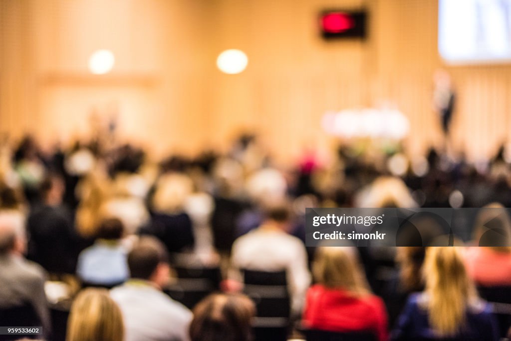 Business people in seminar at auditorium