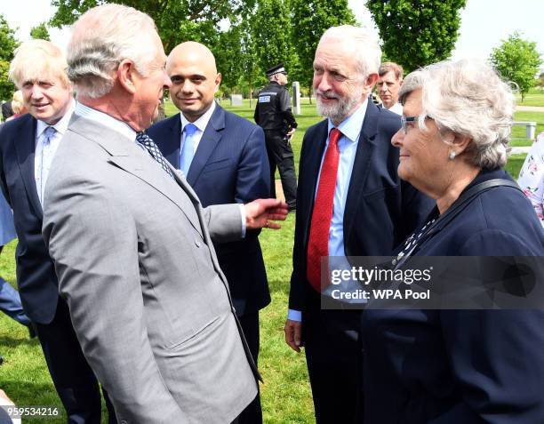 Prince Charles, Prince of Wales chats with Jeremy Corbyn, Leader of the Labour Party following the dedication service for the National Memorial to...