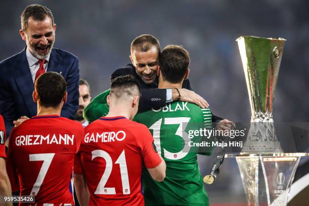 President Aleksander Ceferin presents winners medal to Jan Oblak of Atletico Madrid after the UEFA Europa League Final between Olympique de Marseille...