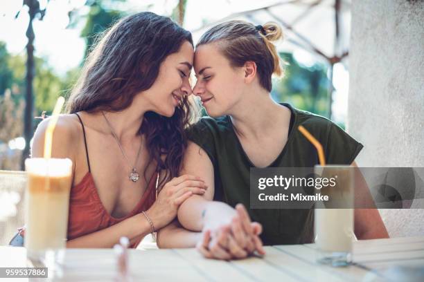 beautiful females dating in the city - lesbian date stock pictures, royalty-free photos & images