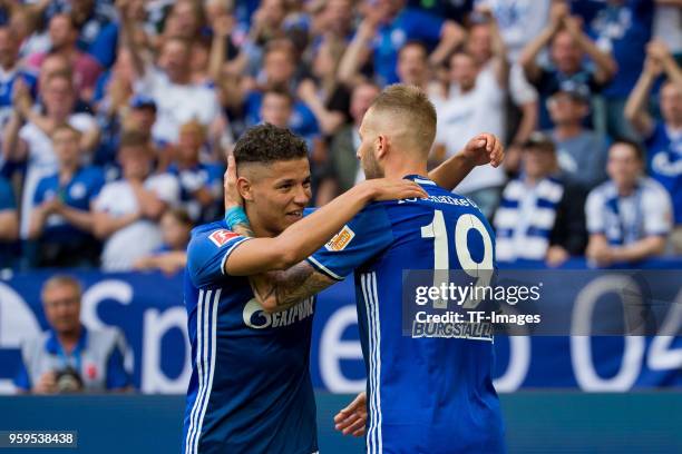 May 12: Guido Burgstaller of Schalke celebrates after scoring his team`s first goal with Amine Harit of Schalke during the Bundesliga match between...