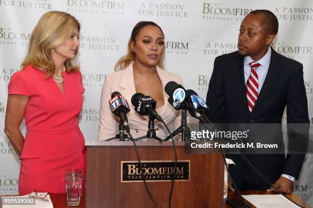 Teairra Mari and her attorneys Lisa Bloom and Walter Mosely speak during a press conference about new legal action against rapper 50 Cent and Akbar...