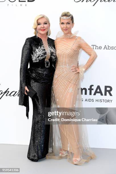 Yulia Yanina and Dasha Yanina arrive at the amfAR Gala Cannes 2018 at Hotel du Cap-Eden-Roc on May 17, 2018 in Cap d'Antibes, France.