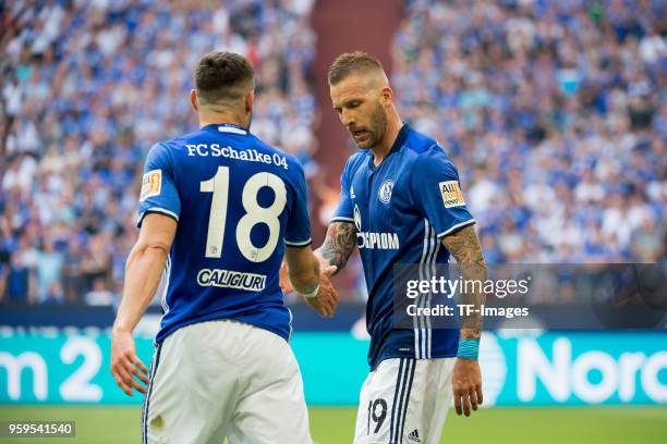 May 12: Guido Burgstaller of Schalke celebrates after scoring his team`s first goal with Daniel Caligiuri of Schalke during the Bundesliga match...