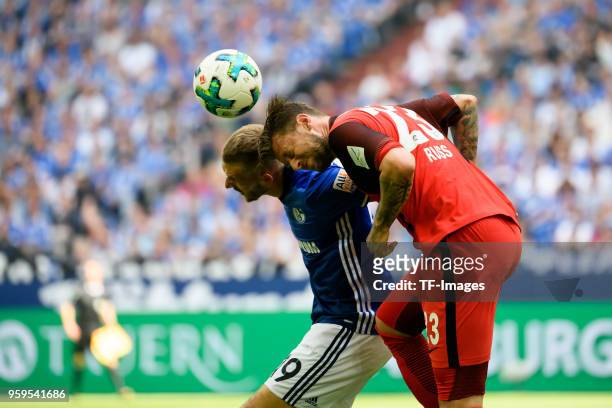 May 12: Guido Burgstaller of Schalke and Marco Russ of Frankfurt battle for the ball during the Bundesliga match between FC Schalke 04 and Eintracht...