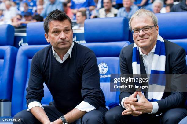 May 12: Manager Christian Heidel of Schalke and Peter Peters of Schalke look on prior to the Bundesliga match between FC Schalke 04 and Eintracht...