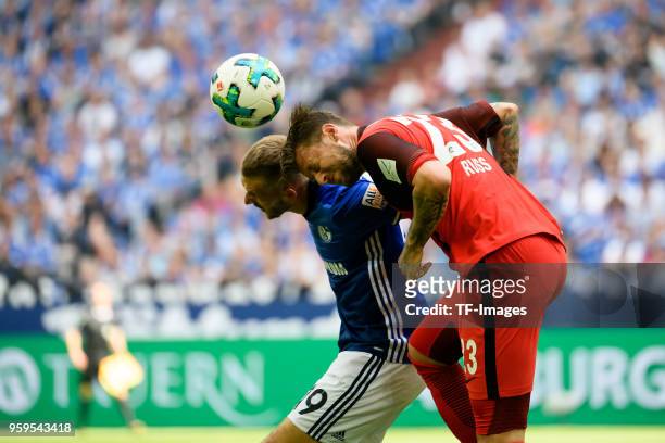 May 12: Guido Burgstaller of Schalke and Marco Russ of Frankfurt battle for the ball during the Bundesliga match between FC Schalke 04 and Eintracht...