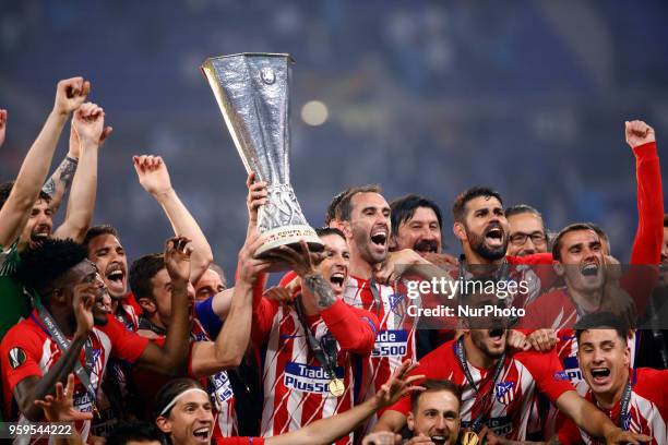 The Club Atletico de Madrid team celebrates after winning the UEFA Europa League Final between Olympique de Marseille and Club Atletico de Madrid at...