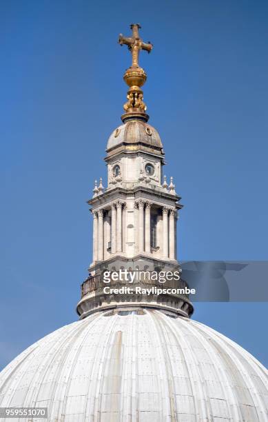 tourists taking in the view from ‘the golden gallery’ at the very top of st paul’s cathedral. this is the smallest of the galleries and runs around the highest point of the outer dome - st paul's cathedral london stock pictures, royalty-free photos & images