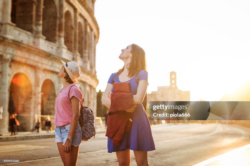 Tourist women in Rome: by the Coliseum