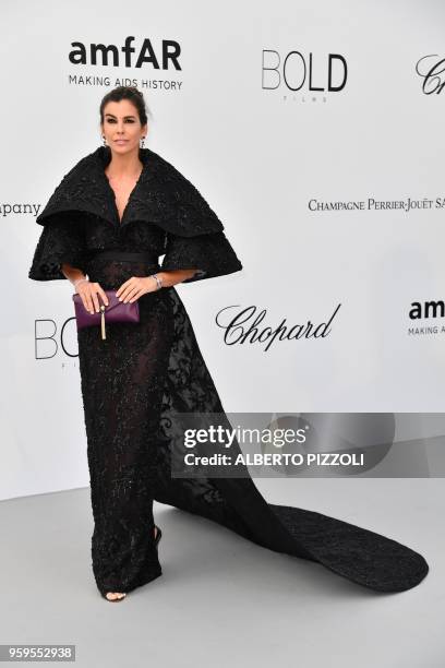 Brazilian fashion buyer Christina Pitanguy arrives on May 17, 2018 for the amfAR 25th Annual Cinema Against AIDS gala at the Hotel du Cap-Eden-Roc in...