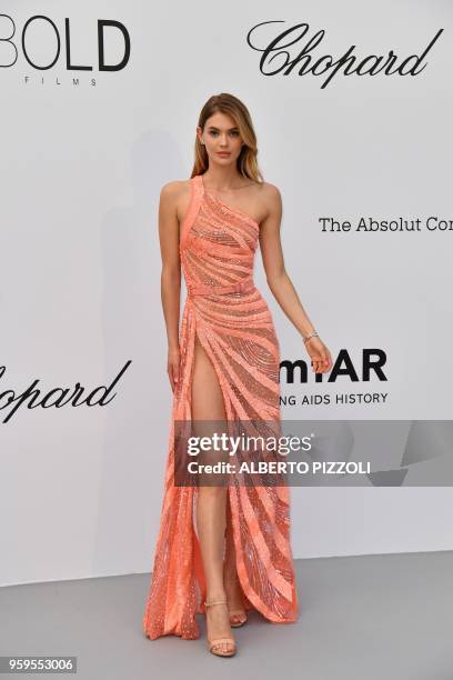 British model Megan Williams arrives on May 17, 2018 for the amfAR 25th Annual Cinema Against AIDS gala at the Hotel du Cap-Eden-Roc in Cap...