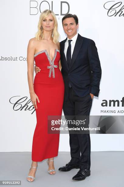 Karolina Kurkova and Archie Drury arrive at the amfAR Gala Cannes 2018 at Hotel du Cap-Eden-Roc on May 17, 2018 in Cap d'Antibes, France.