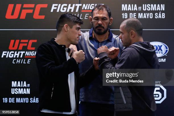 Welterweight fighters Vicente Luque of the United States and Chad Laprise of Canada face off during Ultimate Media Day on May 17, 2018 in Santiago,...