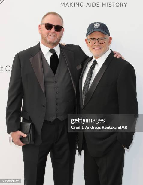 AmfAR CEO Kevin Robert Frost and amfAR Interim Chairman of the Board William H. Roedy arrive at the amfAR Gala Cannes 2018 at Hotel du Cap-Eden-Roc...