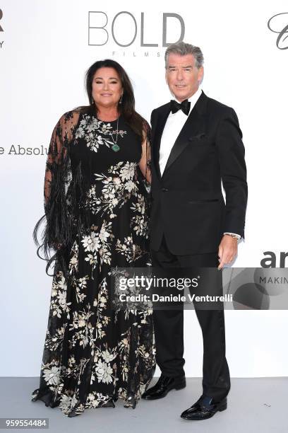 Pierce Brosnan and his wife Keely Shaye Smith arrive at the amfAR Gala Cannes 2018 at Hotel du Cap-Eden-Roc on May 17, 2018 in Cap d'Antibes, France.