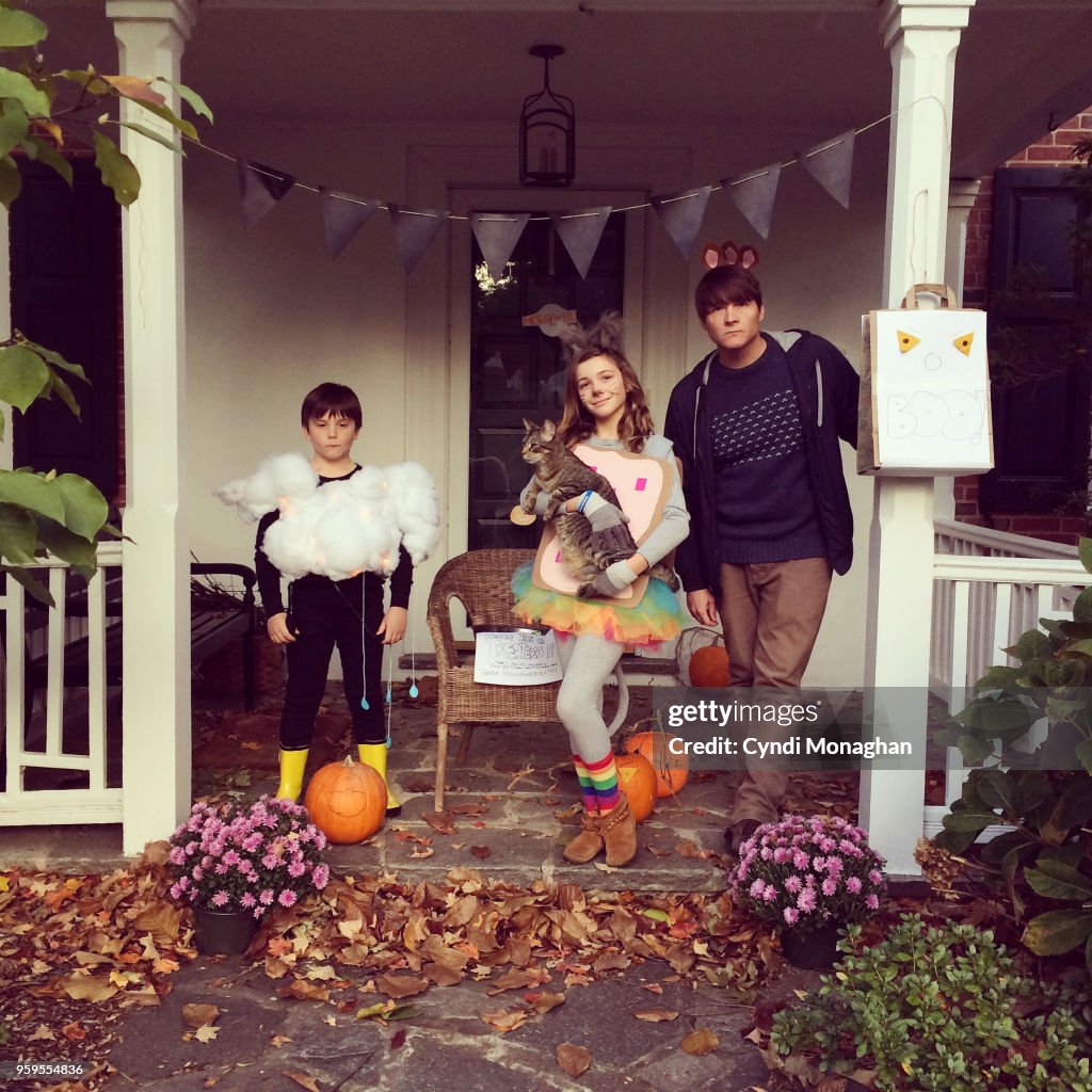 Portrait of a Family Dressed Up for Halloween