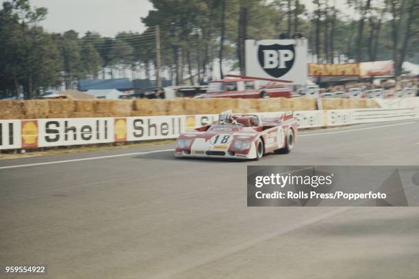 View of the Autodelta SpA Alfa Romeo Tipo 33TT3 racing car driven by Nino Vaccarella and Andrea de Adamich of Italy competing to finish in 4th place...