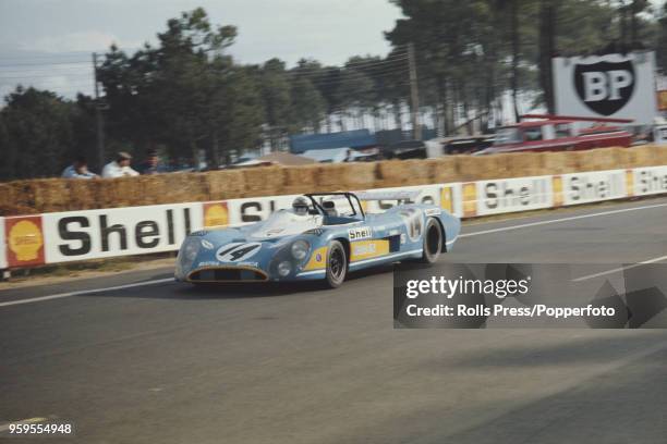View of the Equipe Matra-Simca Shell Matra-Simca MS670 racing car driven by Francois Cevert of France and Howden Ganley of New Zealand competing to...