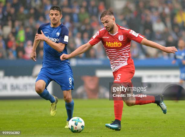 Anthony Losilla of Bochum and Benedikt Gimber of Regensburg battle for the ball during the second Bundesliga match between VfL Bochum 1848 and SSV...