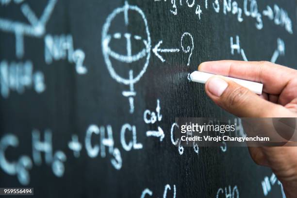 educational institution - physics equation stock pictures, royalty-free photos & images