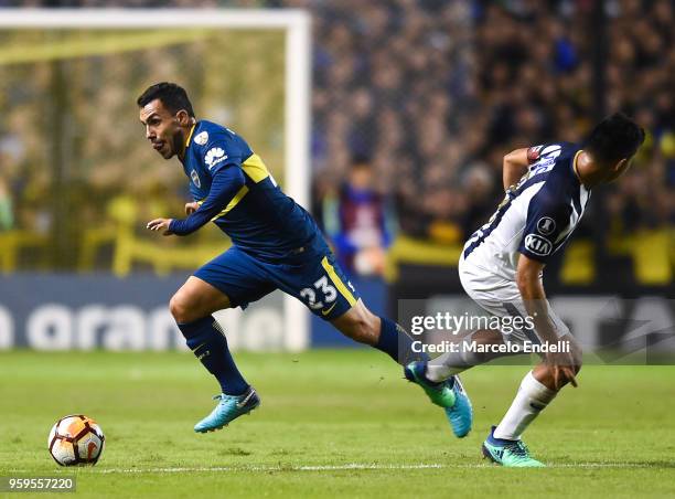 Carlos Tevez of Boca Juniors drives the ball during a match between Boca Juniors and Alianza Lima at Alberto J. Armando Stadium on May 16, 2018 in La...